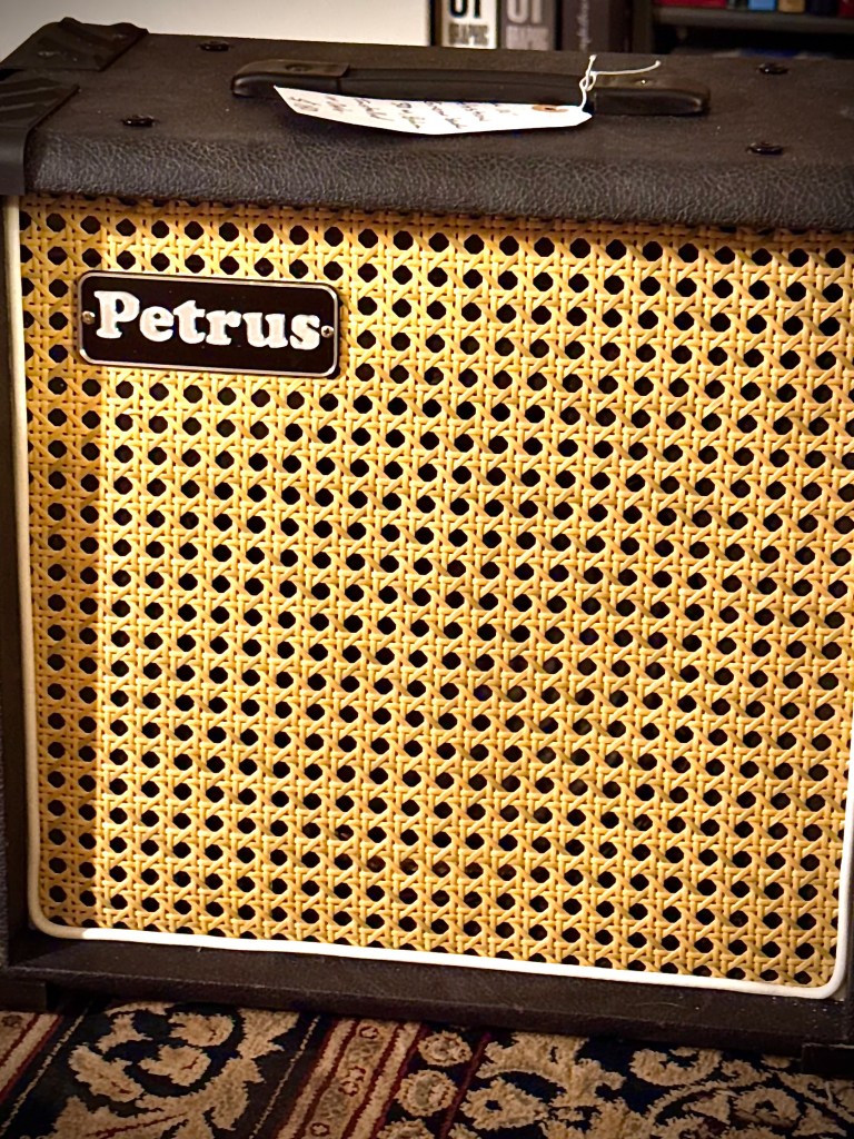 10" Celestion Greenback guitar speaker in open cabinet for rent.
